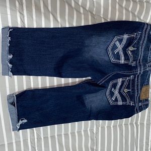 Dark blue denim Capri above the knee jeans